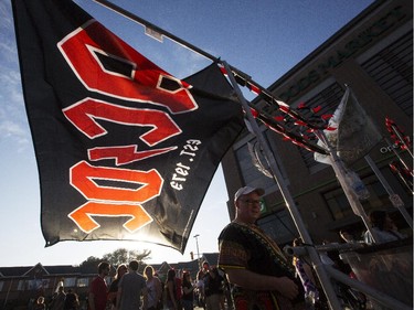 Fans flock to buy merchandise before the AC/DC concert.