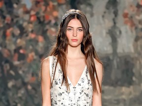 In April, Laura Winges walked the runway in New York City wearing a dress from the Jenny Packham Bridal Spring 2016 collection