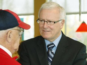MP Bill Casey (R)  listens to a constituent in Amherst, Nova Scotia, in this Oct. 27, 2007 file photo.