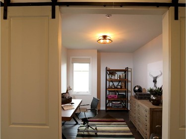 One of the secondary bedrooms in the Killarney is finished as an office, with the closet removed, an enlarged opening and sliding barn-style doors to give it a different, more open look.