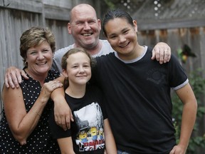 From left, Brenda Boylan, her daughter Ireland, husband Chris and son Isaiah. Isaiah and Ireland have Fetal Alcohol Spectrum Disorder.