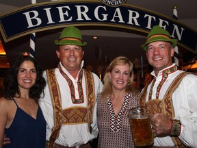 From left, Pia Rhodes with her husband, Tony Rhodes, who co-chaired with Steve Gallant, seen with his wife, Janet, the Capital Oktoberfest benefit for the University of Ottawa Heart Institute held Wednesday, September 23, 2015 at the Bier Markt on Sparks Street.
