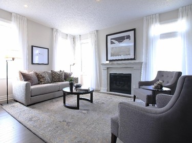The fireplace is one of several upgrades in the Serenade, which has more of a contemporary feel and is done in shades of grey.
