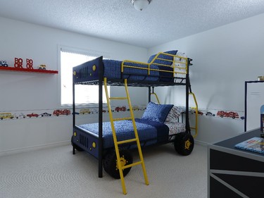 Boys rule in the other loft bedroom in the Charleston. It features a double decker Jeep for a bed.