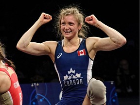 Gen Morrison celebrates after using a late takedown to defeat Russia's Valentina Ivanovna Islamova Brik to win the women's freestyle 48-kilogram class bronze medal at the world wrestling championships in Las Vegas.