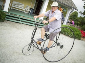 Guy-Paul Cossette takes a spin on a vintage bicycle at Mackenzie King Estate on  Sunday, Sept. 6, 2015.