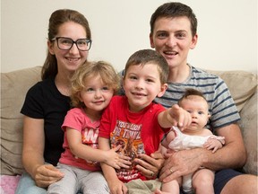 Heather Bourdon and her husband, Dominique Bourdon, with their children, from left, Carmel, three months, Gianna, 2 1/2, and Jacob, 4 1/2 Jacob has autism and his treatment costs $5,000 a month.