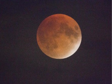 Hi   Here are two photos of the eclipse last night, taken at the Aviation and Space Museum through my telescope.  We had a great turnout at the event, many people came to watch the eclipse and view the moon through telescopes.   The cloud held off until just before the total eclipse but cleared up briefly during totality.