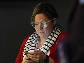 Conservative Party campaign manager Jenni Byrne, right, is seen at a Harper campaign stop in Toronto, Ontario on Tuesday, August 18, 2015.