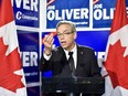 Federal finance minister and Conservative candidate Joe Oliver speaks during a press conference in Toronto on Wednesday, September 30, 2015.