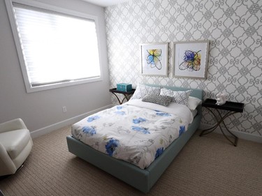 ‘We want to appeal to a family that’s got three kids,’ Correy says of the approach to decorating the other bedrooms. This girl's’ room leaves plenty of room to play even with the double bed.