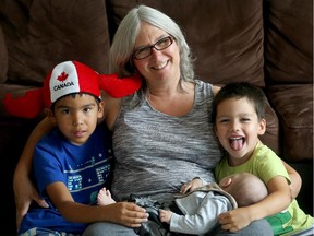 Kim Easy is a single mother to her three adopted kids (from left: Jeremiah, 6, Ezra, 11 weeks and Gideon, 4) - all of whom have Fetal Alcohol Spectrum Disorder. (Julie Oliver / Ottawa Citizen)
