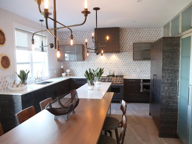 Rather than have a separate breakfast table in the kitchen, Correy opted to go more casual, adding a walnut extension to the island that comfortably seats six. ‘It means maybe you use your dining room more, maybe it’s not just for occasional guests,’ she says.