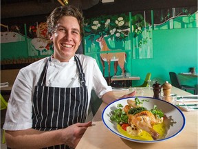 Kyle Decan, Chef of The Rowan on Bank St in the Glebe, with a dish of a half roast chicken with fenugreek potatoes, coriander chutney, and cauliflower.