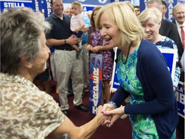 Laureen Harper, wife of Conservative leader Stephen Harper, greets workers while visiting the riding office of Conservative candidate Stella Ambler  Wednesday, August 5, 2015 in Mississauga, Ont.