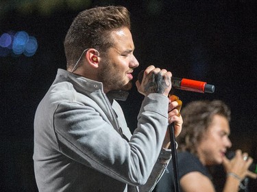 Liam Payne singing as the band One Direction takes to the stage at Canadian Tire Centre on Tuesday night.