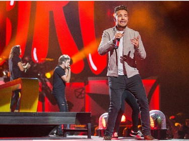 Liam Payne sings as the band One Direction takes to the stage at Canadian Tire Centre on Tuesday night.