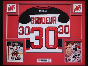 One of the autographed hockey jerseys stolen from charity auction.