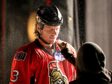 Marc Methot gets given the sweaty look while shooting TV spots at centre ice.