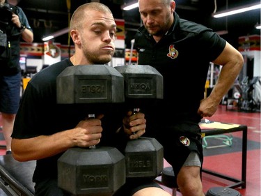 Mark Borowiecki heaves what looks like 250 pounds during a strength test.