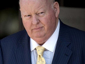 Mike Duffy leaves the courthouse in Ottawa, following  testimony by Nigel Wright, former Chief of Staff to Prime Minister Stephen Harper.