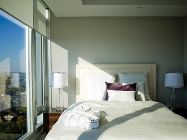 In the bedroom, frosted glass pocket doors provide privacy.