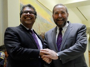 NDP Leader Tom Mulcair meets with Calgary Mayor Naheed Nenshi at City Hall in Calgary, Alberta on Wednesday, September 16, 2015.