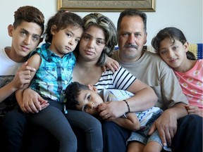 Nabil Al Dabei, 45, feels lucky to be in Canada. He arrived in here with his family (including his wife Manal, 40, sons Bashar,14, and Kareem, 4, and daughters Julie, 11, and Sally, 6) as refugees from Syria just a couple of weeks ago, on August 17