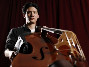 Bass player and orchestra leader Adrian Cho.