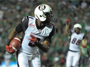 Ottawa Redblacks wide receiver Ernest Jackson carries the ball after making a catch on his team's final drive to set up a 30-27 win over the Saskatchewan Roughriders in Regina on Saturday, Sept. 19, 2015.