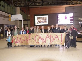 Church sponsorships are a traditional way to help refugees settle in Canada. Here, parishioners from St. Martin de Porres Catholic Church in Nepean greet a family from Syria arriving at the Ottawa airport.