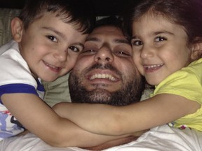Photo of Ceaser Awada and his twins children, Talia and Adam. He hasn't seen them in two years after his former wife abducted them and fled to Lebanon.