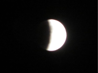 I was able to take several photos of the lunar eclipse before the clouds moved in.