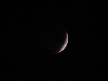 I was able to take several photos of the lunar eclipse before the clouds moved in.