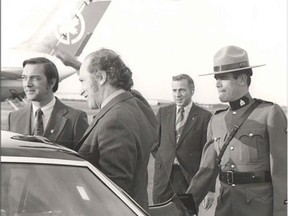 RCMP Chief Supt. Barry Moss (in the striped tie) was the personal security guard for Prime Minister Pierre Elliott Trudeau.  Moss died Nov. 16, 2014 at age 85.