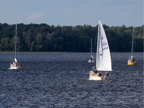 Sailors from the Nepean Sailing Club head out onto the Ottawa River  on July 30, 2015.