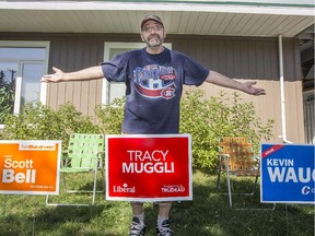 Which party will win him over? Saskatoon voter Brian Krzyzaniak cannot decide who to vote for in the upcoming federal election and has signs for three parties on his lawn.