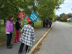 Small group of picketers at Severn Public School on Wednesday.