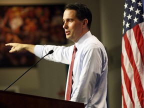 Republican presidential candidate, Wisconsin Gov. Scott Walker speaks during a campaign stop called Politics and Eggs with business leaders and political activist, Friday, Aug. 21, 2015, in Manchester, N.H.