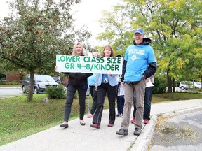 Teachers at A. Lorne Cassidy Elementary school walk on Wynne Wednesday in Ottawa on September 30, 2015.