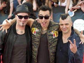 Hedley arrives on the red carpet at the Much Music Video Awards in Toronto, Sunday June 15, 2014.