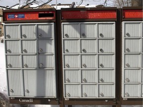 A community mailbox is seen in the east end of Montreal Thursday, March 5, 2015. Canada Post is halting the installation of community mailboxes, one week after the Trudeau Liberals were elected with a pledge to scrap the move away from door-to-door mail delivery.