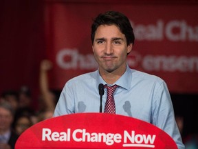 Canadian Liberal Party leader Justin Trudeau speaks at a victory rally in Ottawa on October 20, 2015 after winning the general election. Canadians will soon find out what "real change" means, as Parliament comes back Monday.