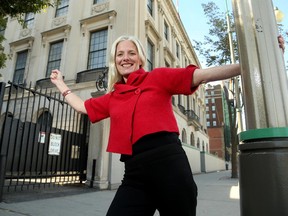 Catherine McKenna, the federal Liberal candidate for Ottawa Centre, announced her intention to transform 100 Wellington Street (former US embassy, at rear) into a destination worthy of Canada's capital Friday, Oct. 2, 2015.