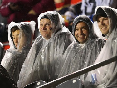 Cold and wet Ottawa Redblacks fans against the Winnipeg Blue Bombers during first half CFL action.