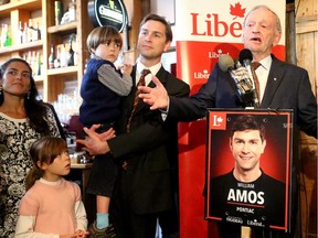 Former Prime Minister Jean Chretien lent his support to Will Amos, the Liberal candidate in the Pontiac, at the Chelsea Pub in Old Chelsea, Quebec Thursday (October 15, 2015). The pub and eatery was crammed with supporters, including Amos' wife, Regina Flores, far left, and their children, Paloma, 7, and Enrique, 4.
