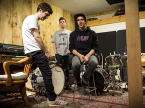 BADBADNOTGOOD band members, from left, Chester Hansen, Alex Sowinski and Matthew Tavares, are seen in their Toronto studio.