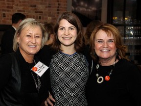 From left, Borden Ladner Gervais lawyer Jane Bachynski, head of a new United Way-led women's giving initiative, called Spark, with United Way Ottawa campaign co-chair Danya Vered and United Way Ottawa executive Joan Highet at a cocktail reception held at Beckta Dining & Wine on Thursday, October 15, 2015, to announce the group's community action grants benefitting Ottawa's priority neighbourhoods.