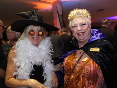 From left, Debbie Orth in costume with AOE Arts Council board member Donna Roney, dressed as the Queen of OrlÈans, at the Halloween-themed ARTinis, an annual benefit soirée for the AOE Arts Council, held at the Shenkman Arts Centre on Thursday, October 29, 2015.