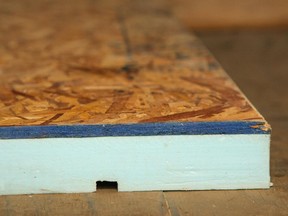 Install a finished floor over this light blue rigid foam insulation that’s sitting on a plywood subfloor and has waferboard on top and you'll enjoy much warmer toes.